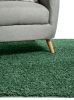 Shaggy szőnyeg Swirls Green 15x15 cm minta